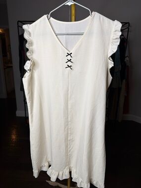 Sleeveless Cream Ruffle Midi Dress with tiny Navy blue bows